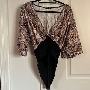 Nasty gal snakeprint and black body suit.